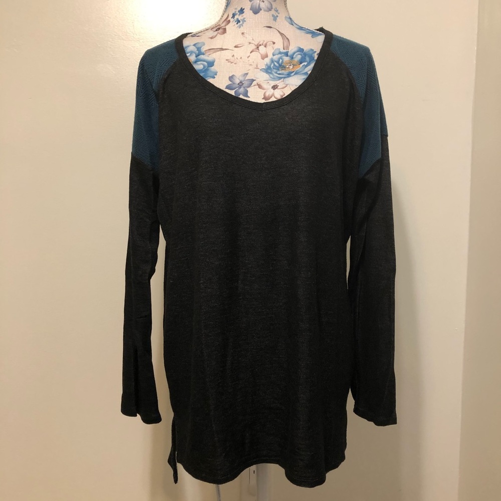 Femme black long sleeve top w/ turquoise shoulders